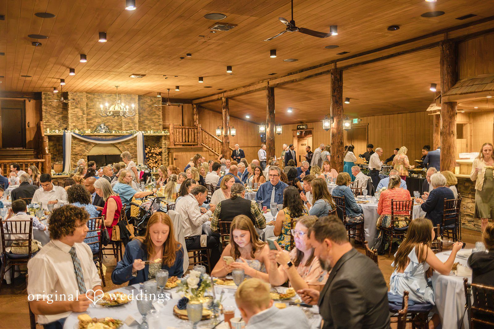 Faith + Brandon Guests filling the reception hall at Spruce Mountain Ranch