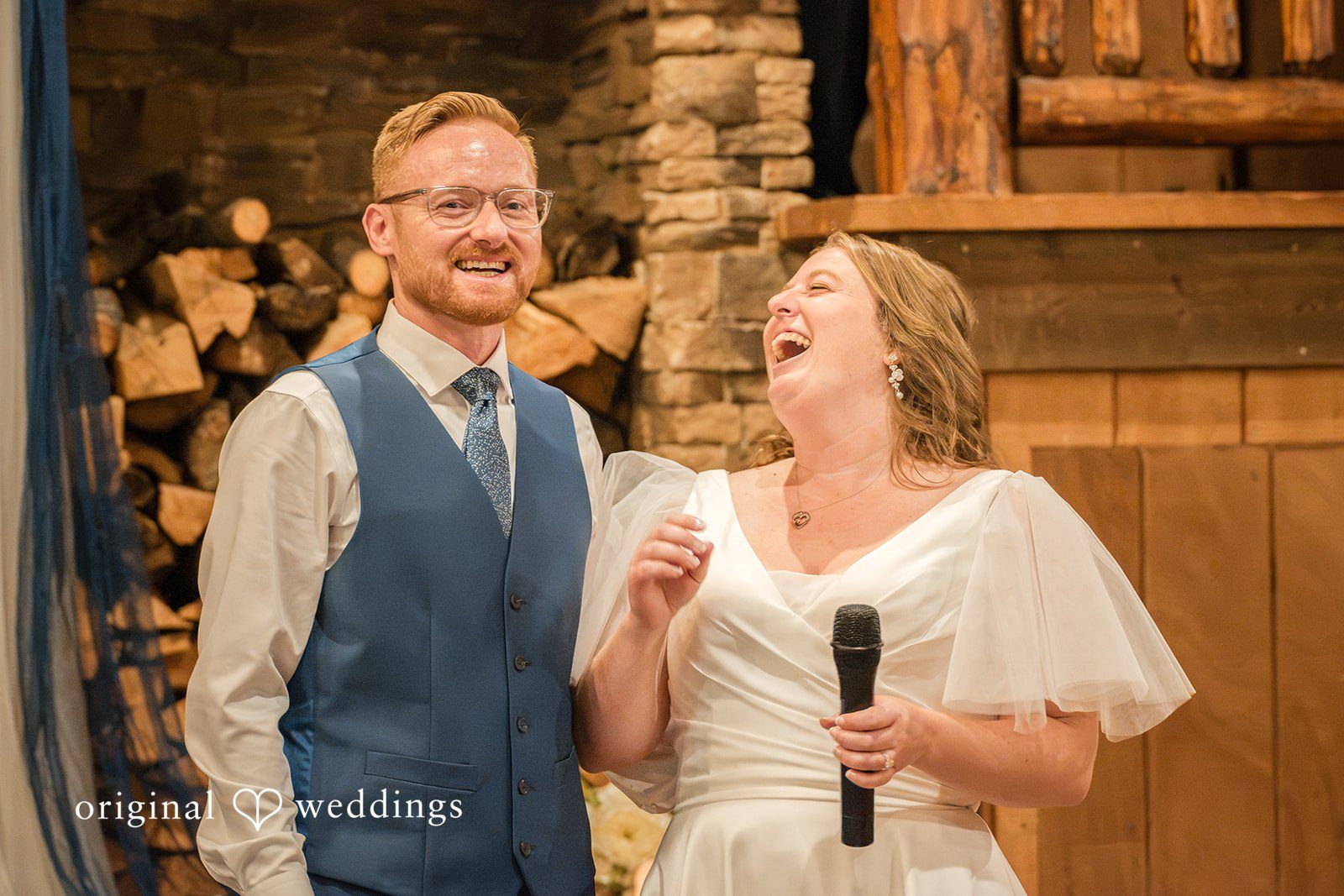 Faith + Brandon Couple laughing during their thank you speech