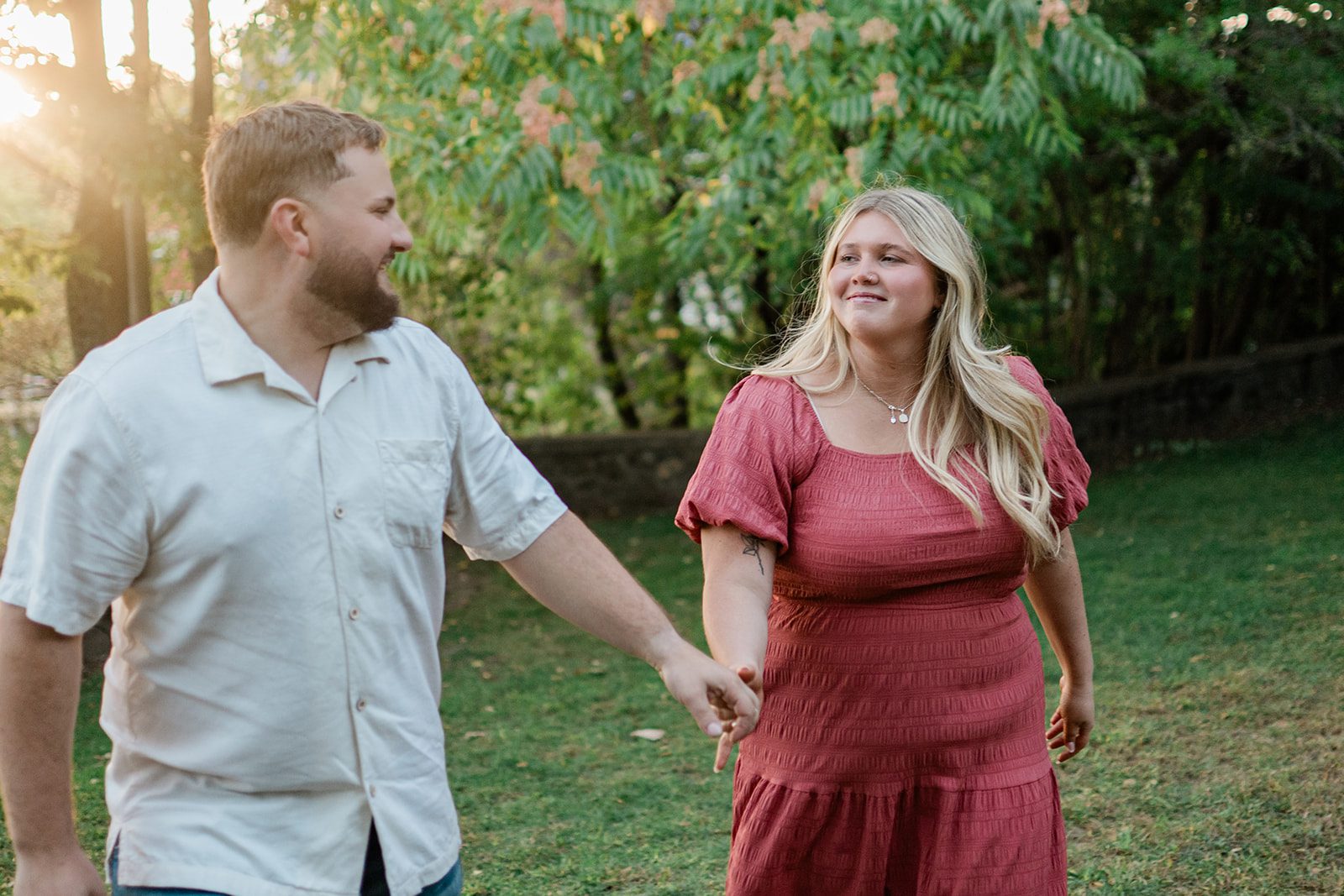 spy-pond-airy-boston-daniel-emily-p013-07 Couple laughing while walking together