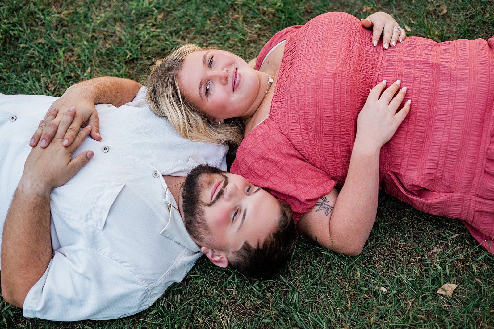 spy-pond-airy-boston-daniel-emily-p020-01 Couple lying together on the grass