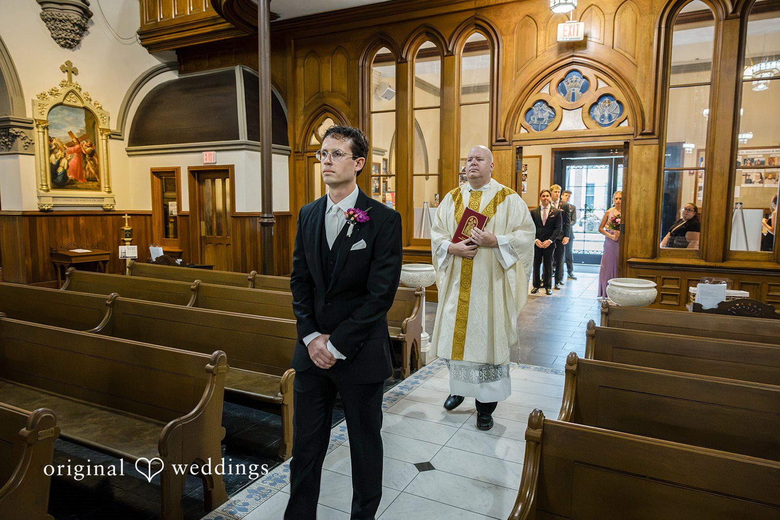 Groom waiting at the altar at St John the Evangelist Catholic Church