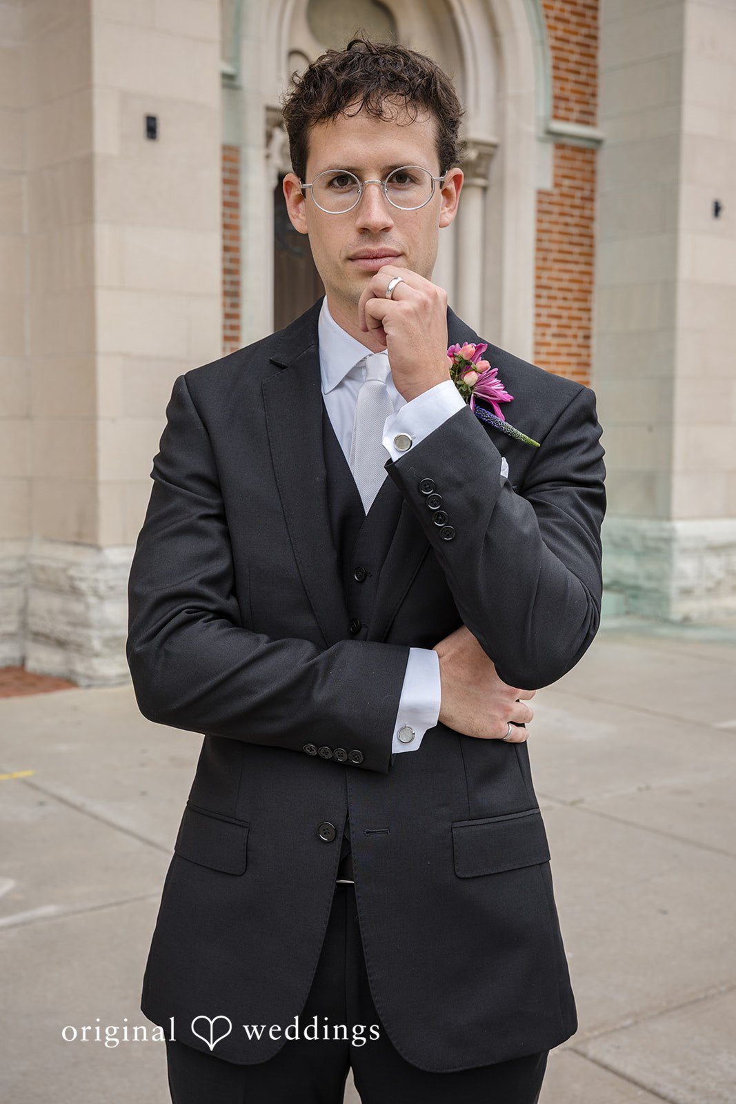 Groom portrait in a dark suit