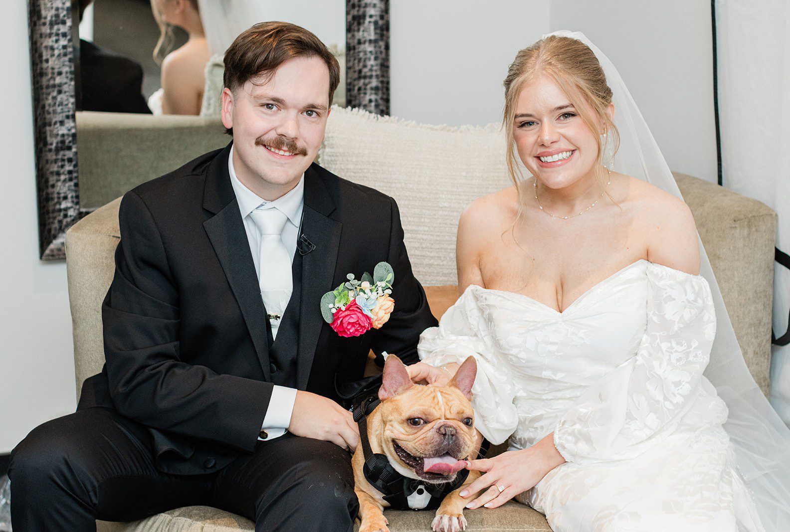 Bride and groom smiling with their dog, captured by St. Louis wedding photographers from Original Weddings at Innsbrook Resort