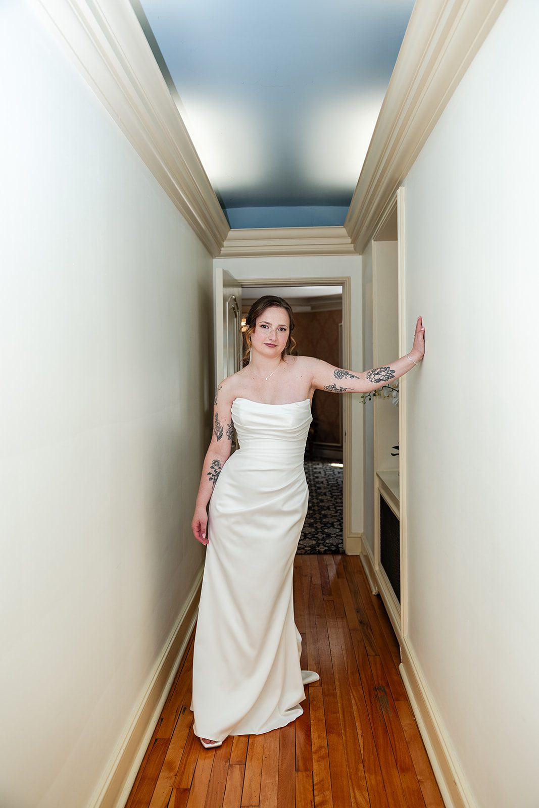Bride in her gown in the hallway at St. Paul College Club Bride in her gown in the hallway at St. Paul College Club