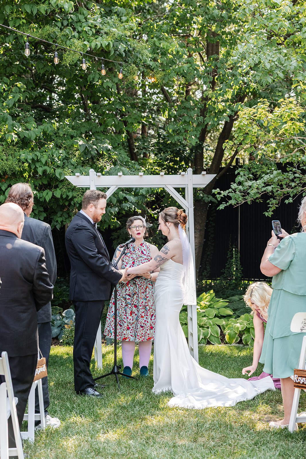 Ceremony under the white arbor at St. Paul College Club Ceremony under the white arbor at St. Paul College Club