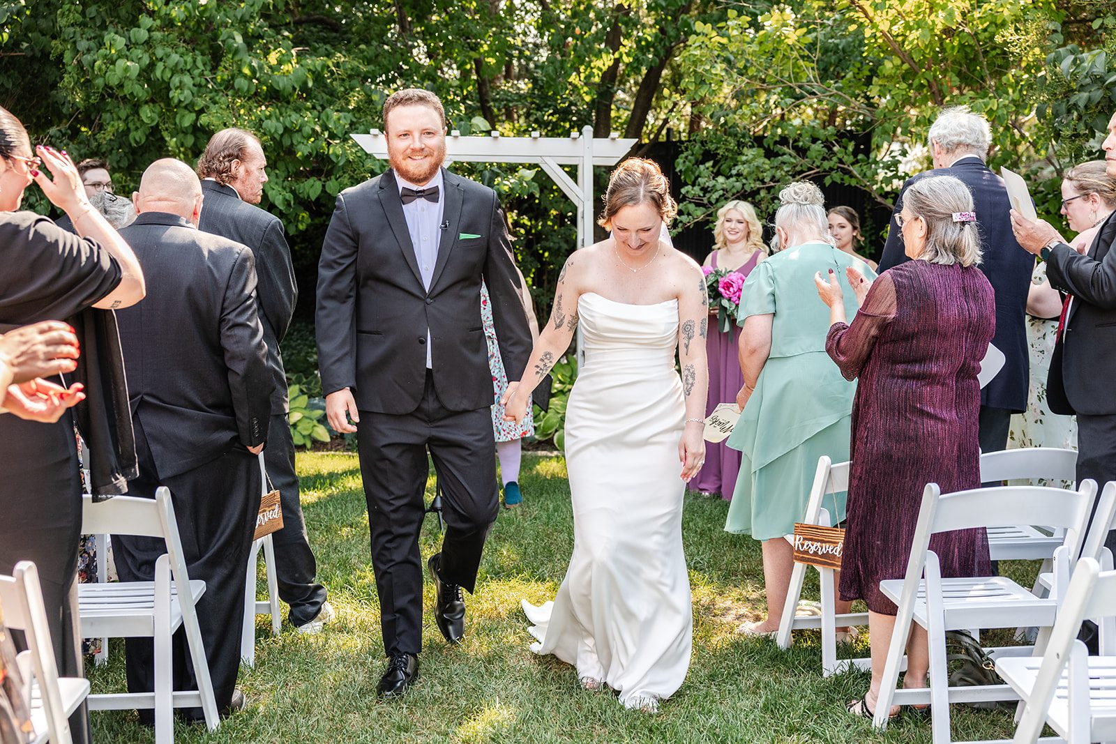Newlyweds walking back down the aisle Newlyweds walking back down the aisle