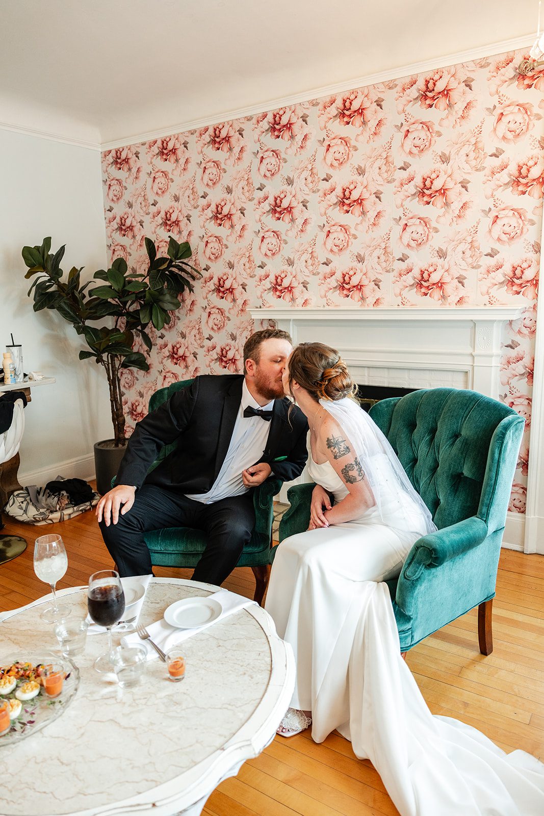 Couple sharing a kiss inside Couple sharing a kiss inside