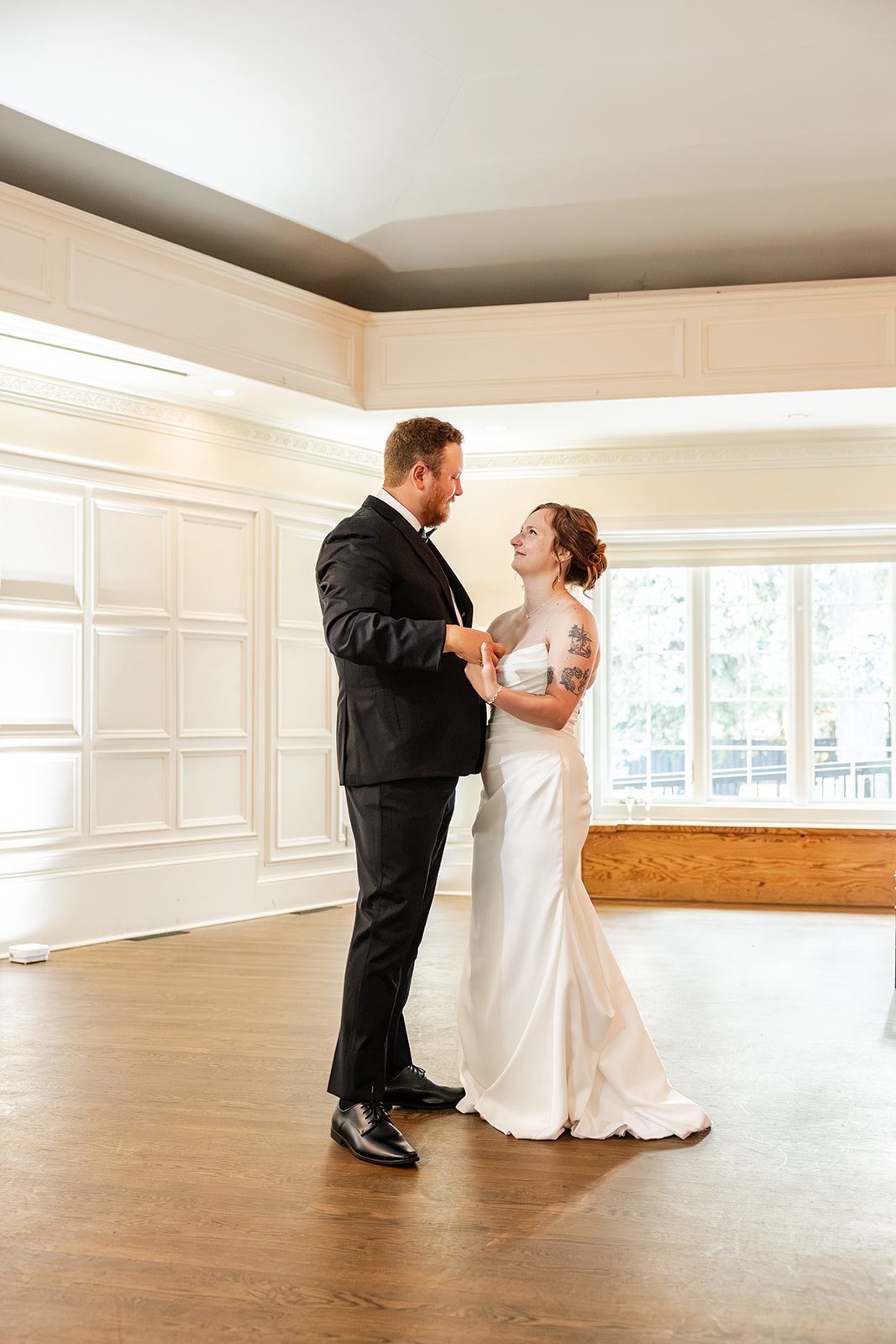 Couple in the empty ballroom at St. Paul College Club Couple in the empty ballroom at St. Paul College Club