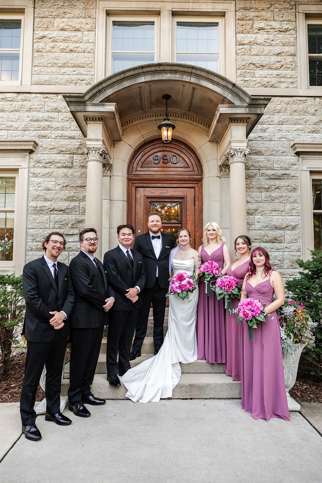 Wedding party at the front entrance Wedding party at the front entrance