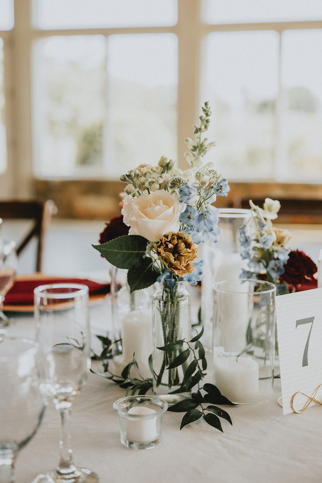 stone-tower-winery-rustic-washington-dc-nikkie-tyler-p008-09 Floral centerpiece with candles