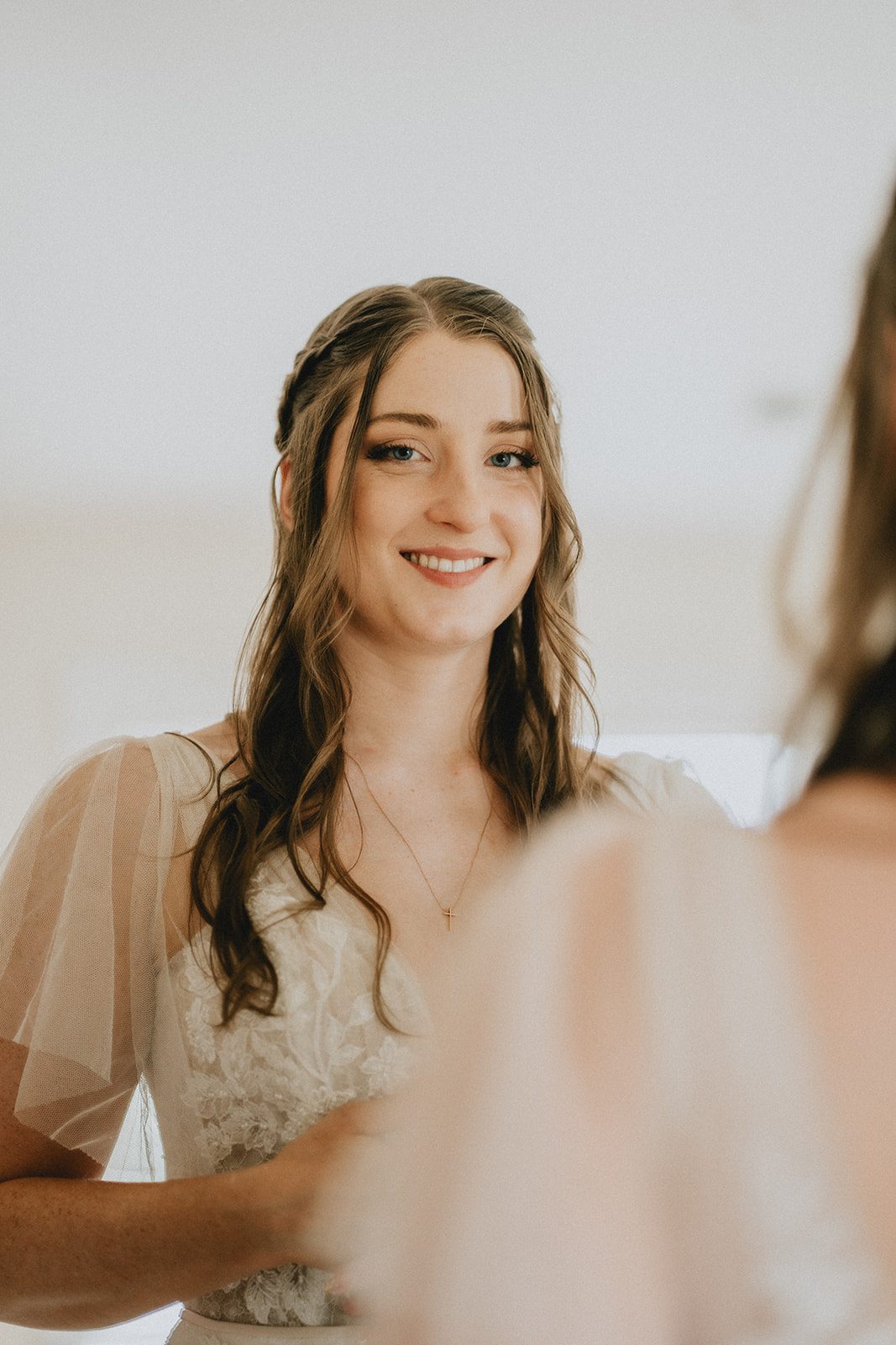 stone-tower-winery-rustic-washington-dc-nikkie-tyler-p011-03 Bride smiling while getting ready