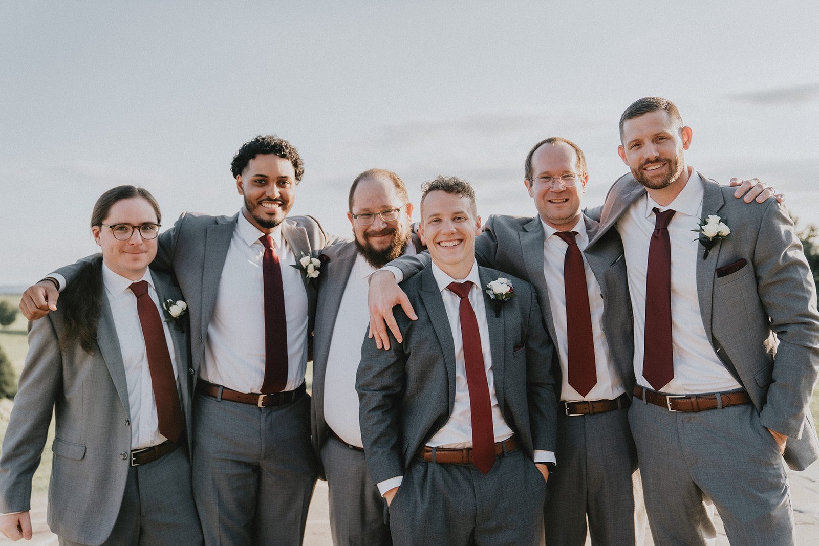 stone-tower-winery-rustic-washington-dc-nikkie-tyler-p017-07 Groom laughing with his groomsmen