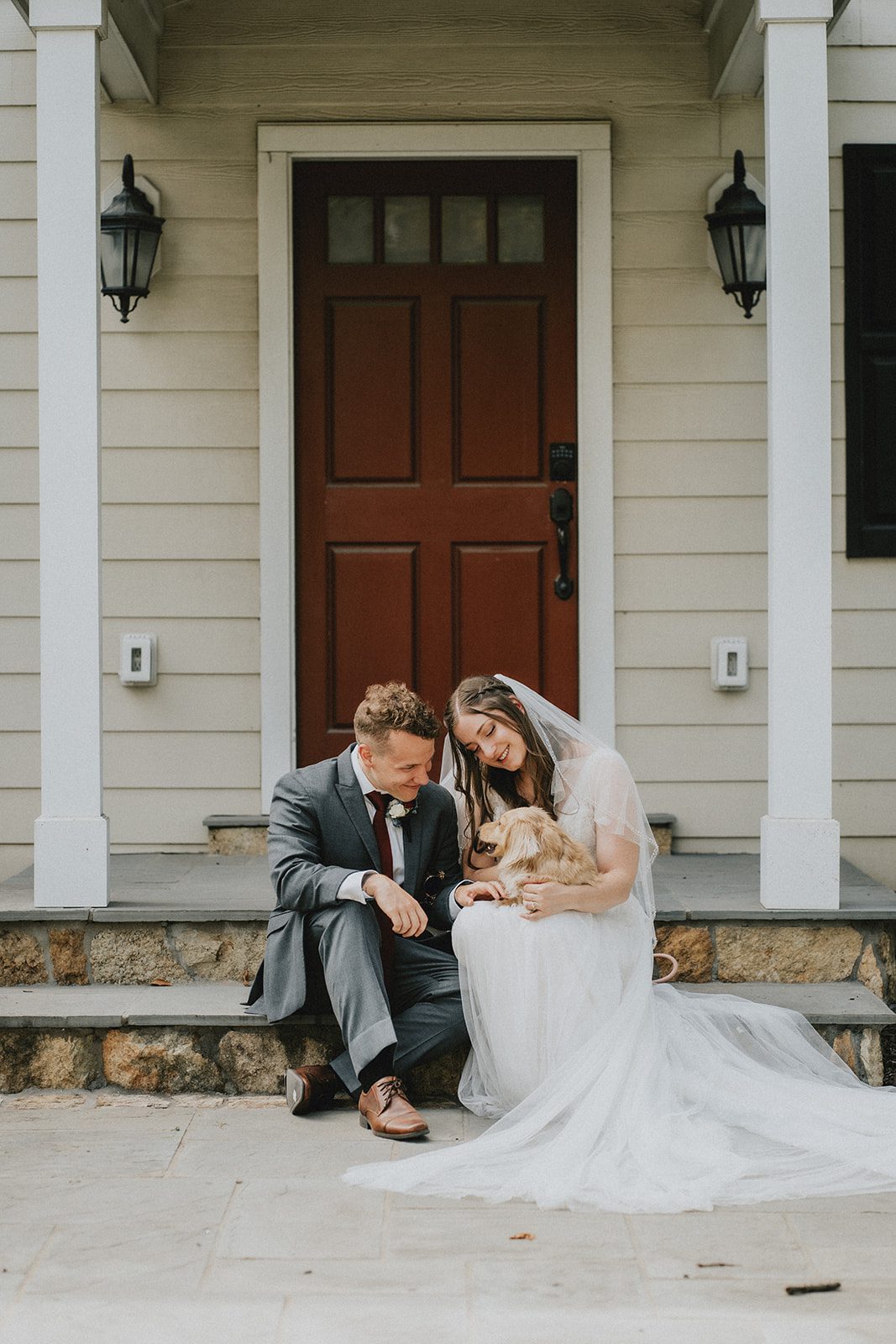 stone-tower-winery-rustic-washington-dc-nikkie-tyler-p031-11 Bride and groom sitting on the porch steps
