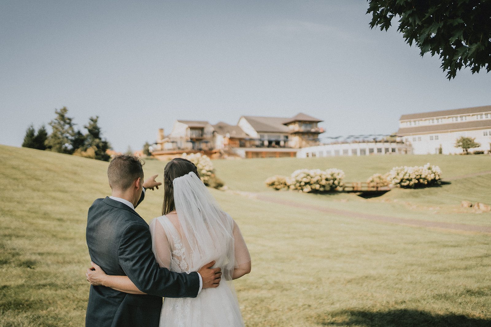 stone-tower-winery-rustic-washington-dc-nikkie-tyler-p039-15 Couple on the hilltop lawn, captured by Washington DC wedding photographers