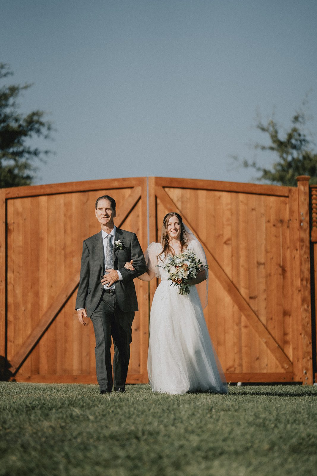 stone-tower-winery-rustic-washington-dc-nikkie-tyler-p040-09 Newlyweds at the wooden barn doors at Stone Tower Winery