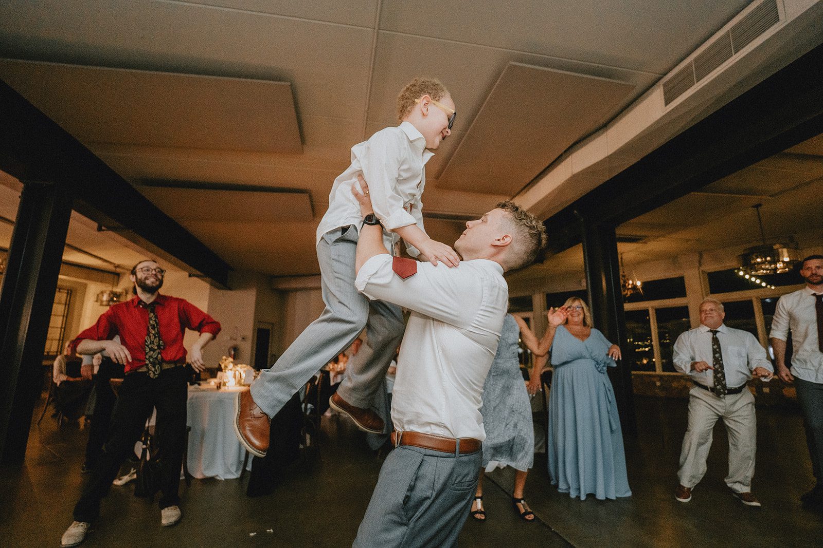 stone-tower-winery-rustic-washington-dc-nikkie-tyler-p050-12 Groom lifted up by friends on the dance floor