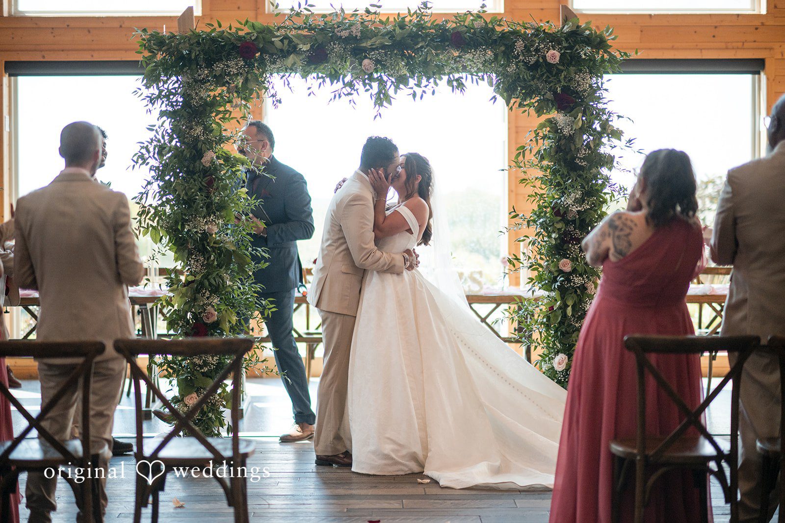 The couple shares a kiss