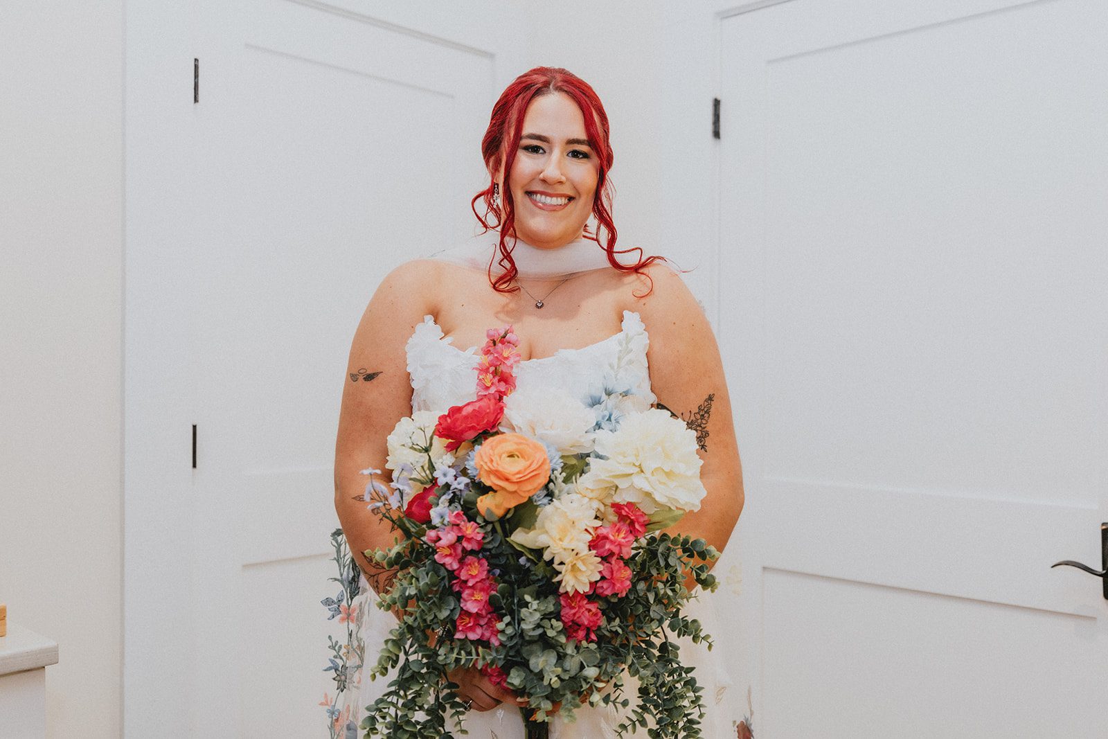 sun-valley-rustic-cleveland-jamie-nick-008-37 Bride holding her wildflower bouquet