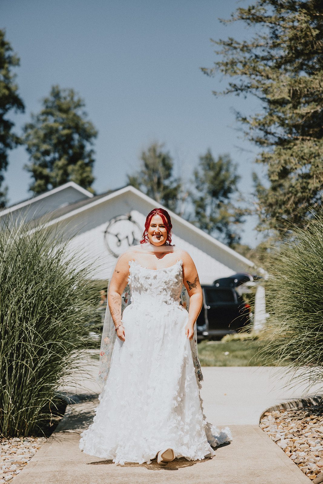 sun-valley-rustic-cleveland-jamie-nick-009-43 Bride smiling in her gown at Sun Valley