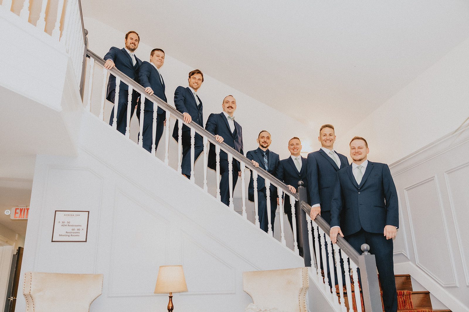 sun-valley-rustic-cleveland-jamie-nick-017-27 Groom and groomsmen on the staircase at Sun Valley