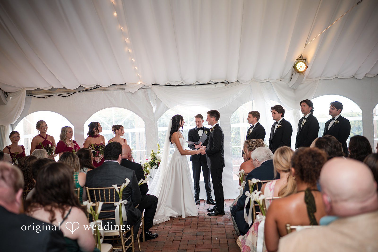 Macy + Nolan A wedding ceremony taking place in front of guests.