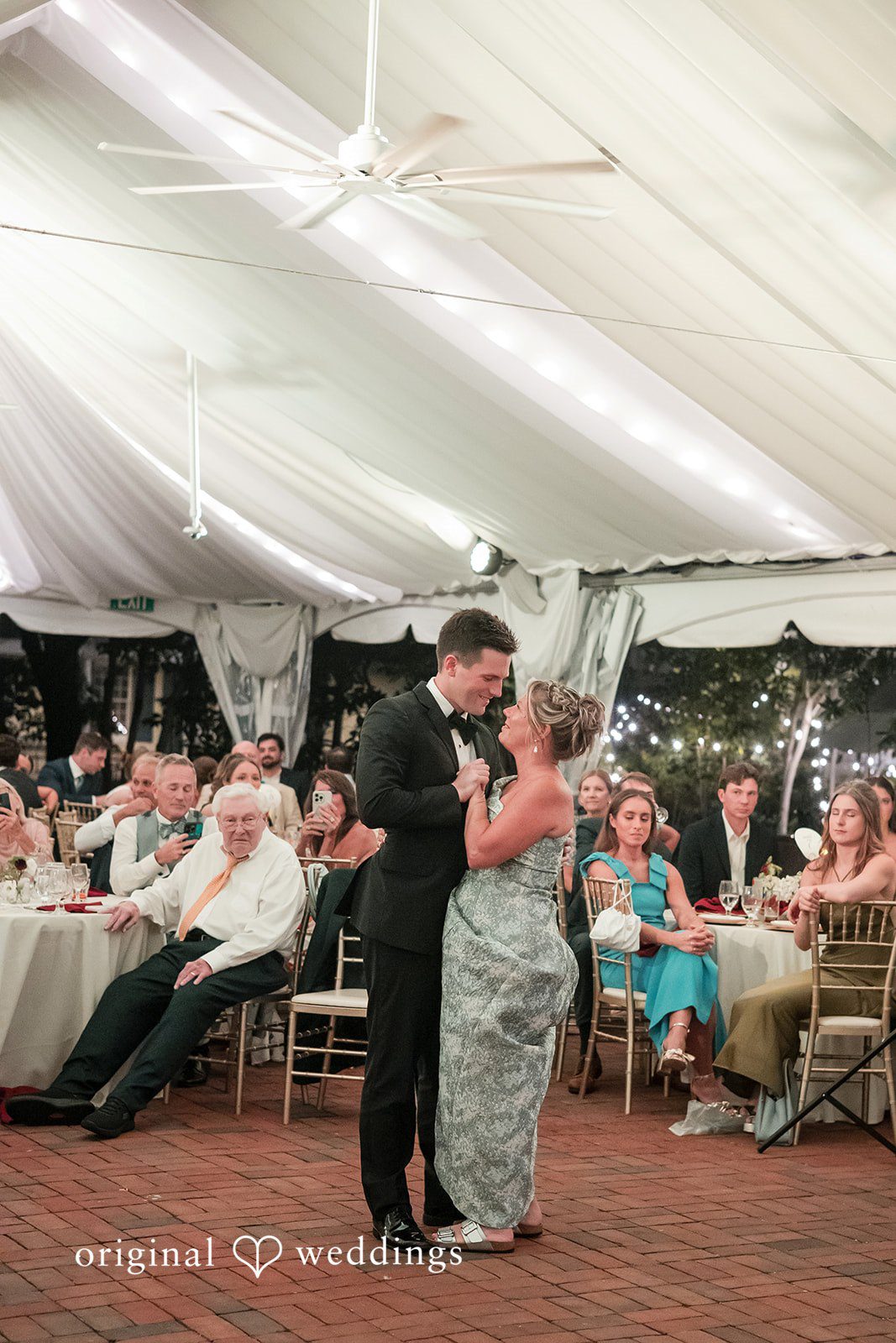 September 12, 2026 – Macy & Nolan – (ID-4760) A wide shot of a reception party dancing under a large white tent.