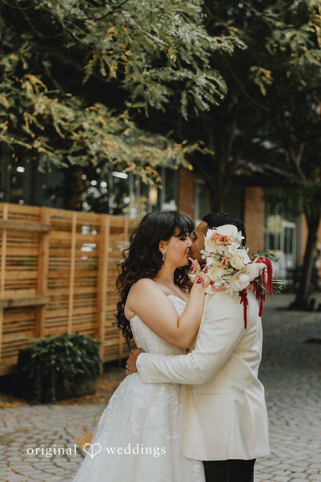 Sasha + Jason The couple shares a kiss