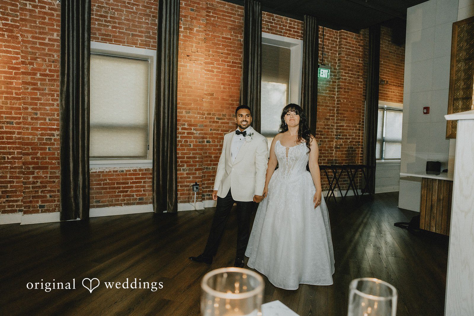 Sasha + Jason The couple walks into the reception hall