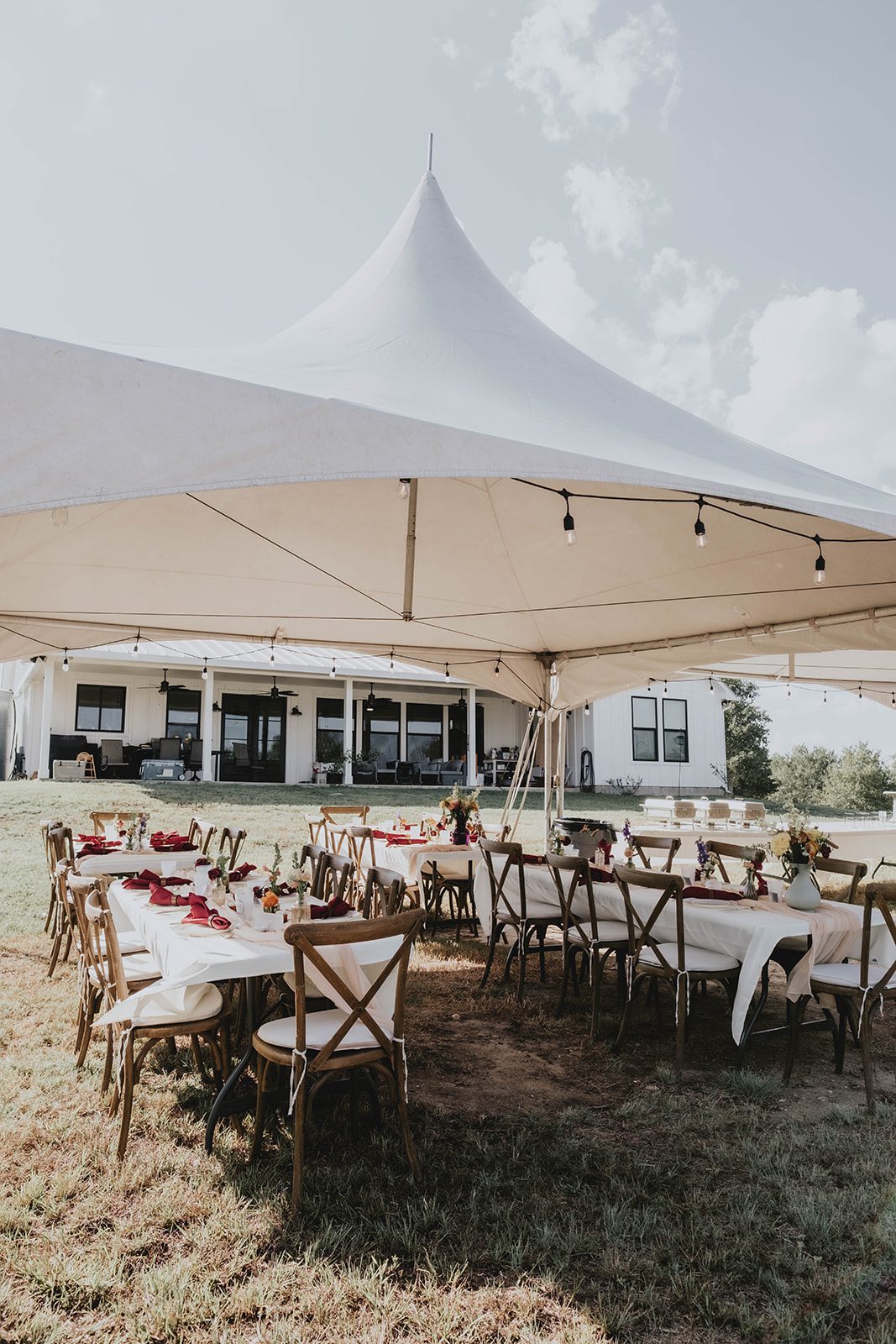 texas-backyard-rustic-austin-megan-kyle-p002-13 White reception tent set up at their Texas backyard wedding