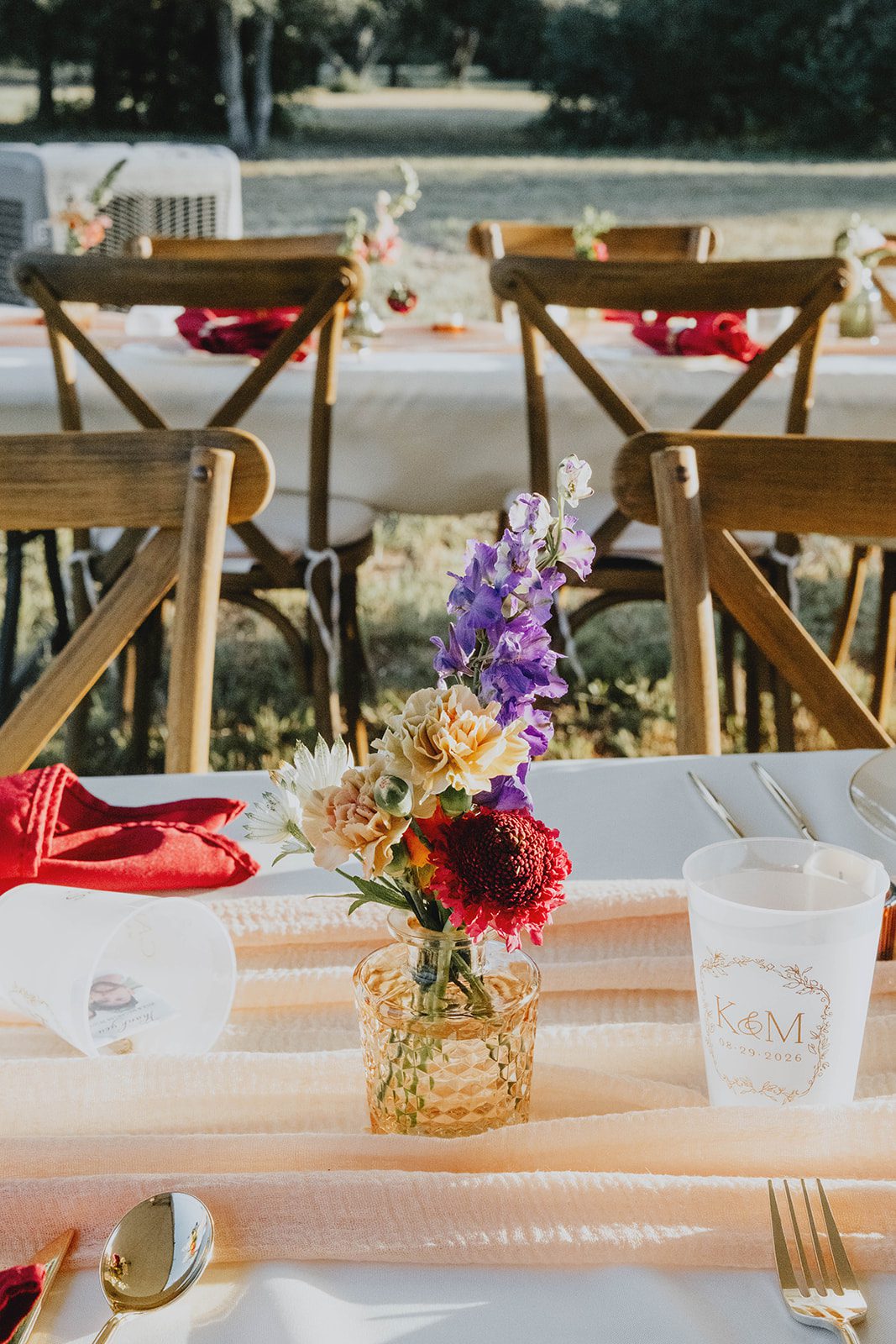 texas-backyard-rustic-austin-megan-kyle-p005-12 Wildflower centerpiece on the reception table