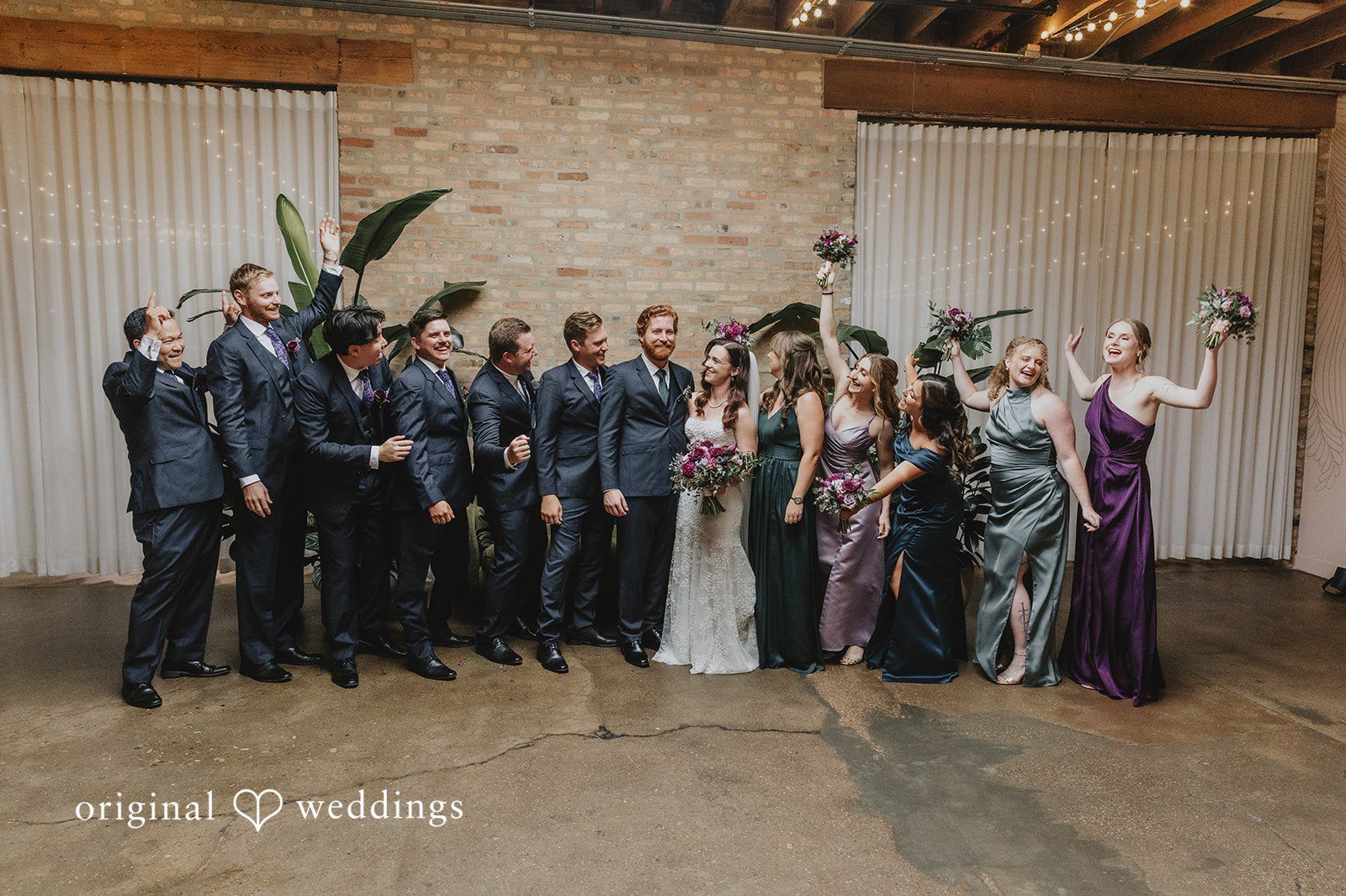 Our Chicago wedding photographers at Original Weddings captured a stunning portrait of the couple and their bridal party at The Arbory