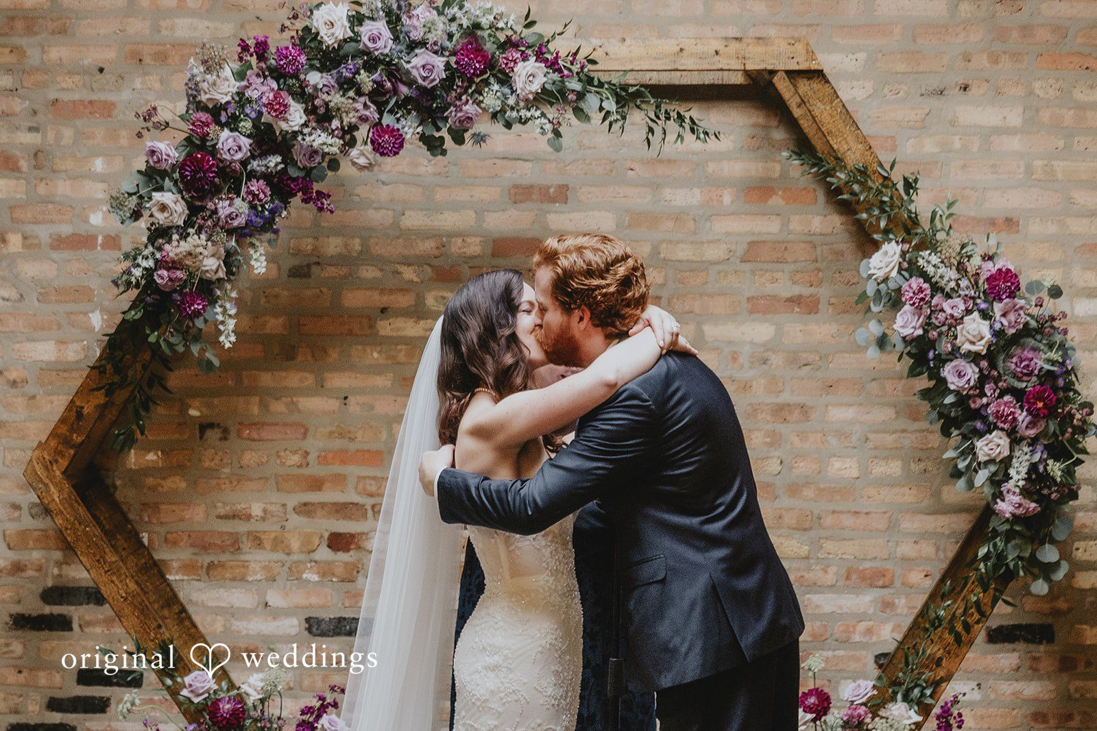 The couple takes their first kiss