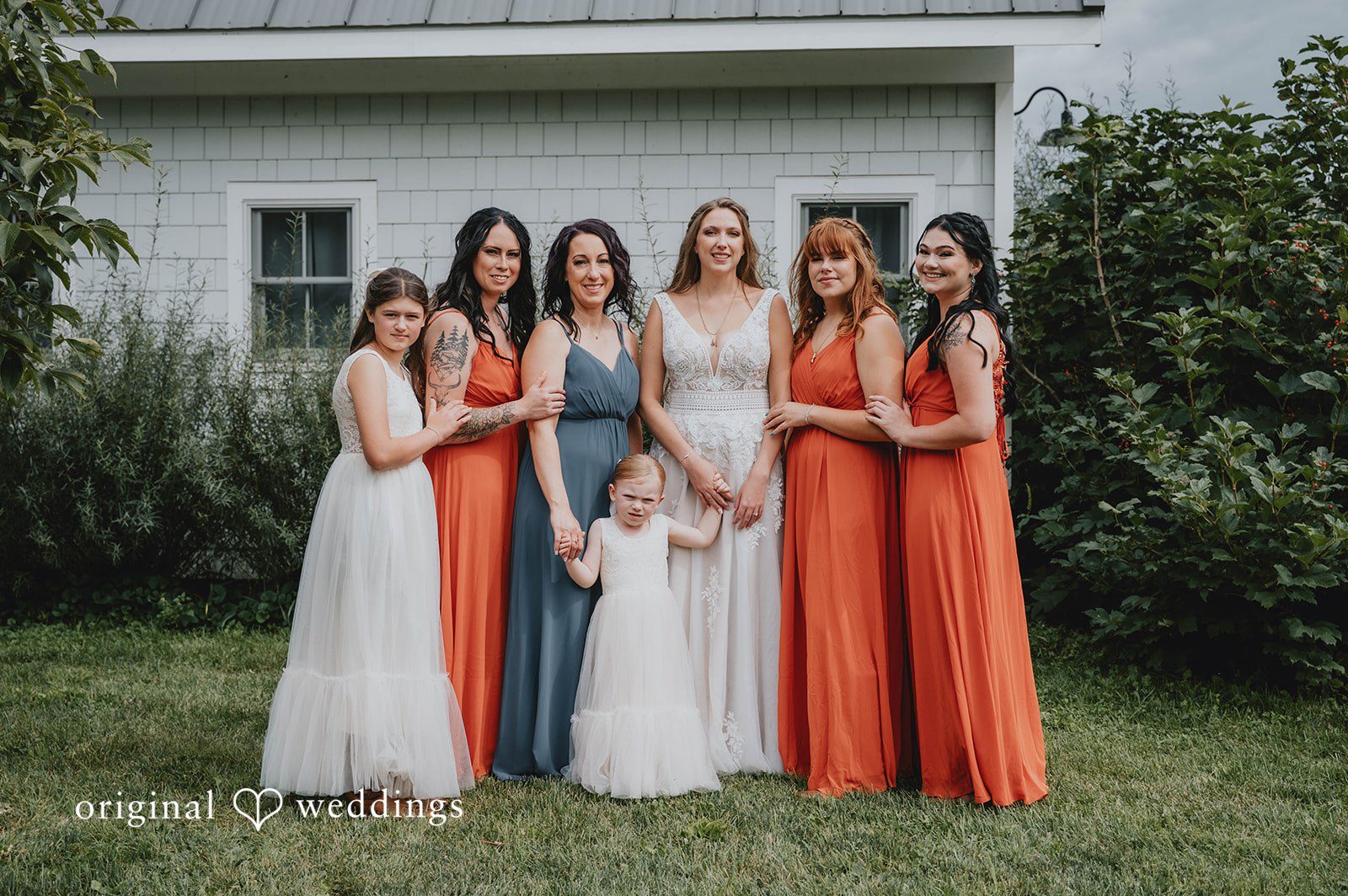 Bride with her bridesmaids at The Barn at Ballard Creek