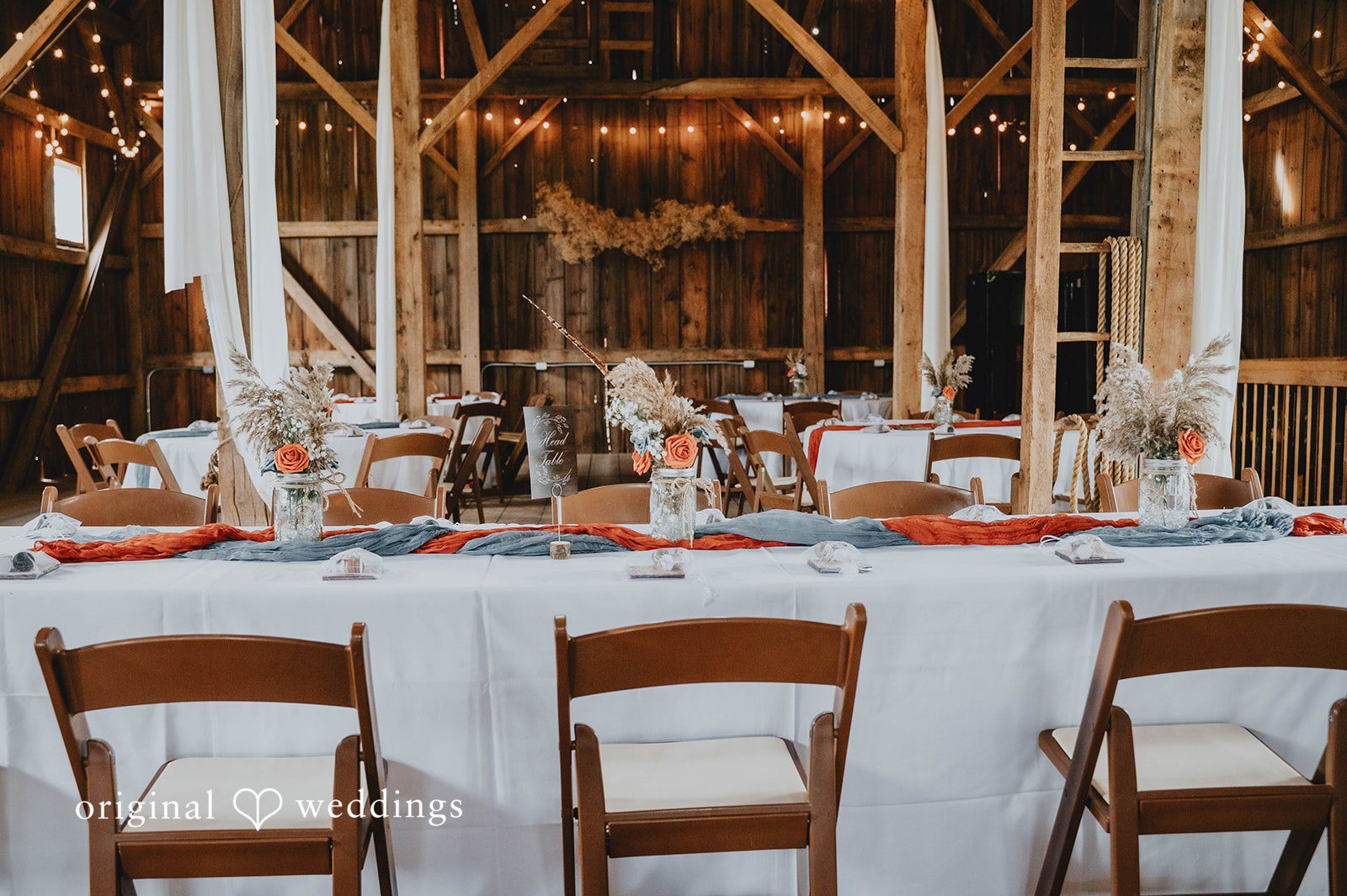 Reception tables in the barn