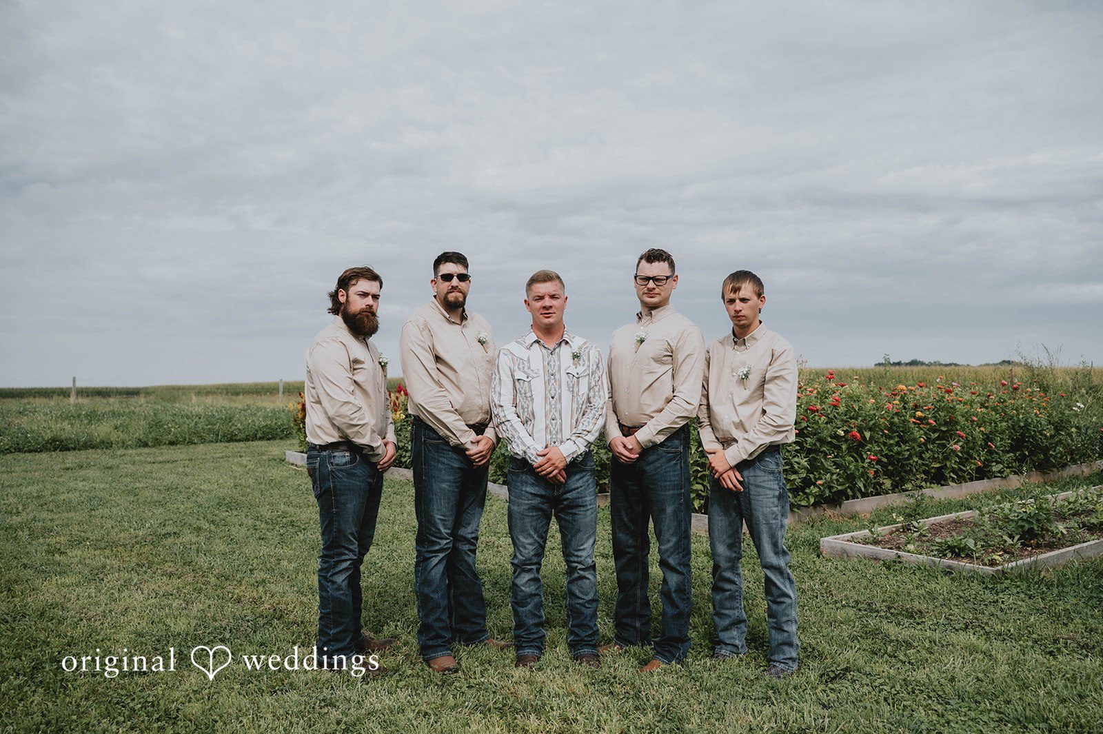 Groom with his groomsmen in the field