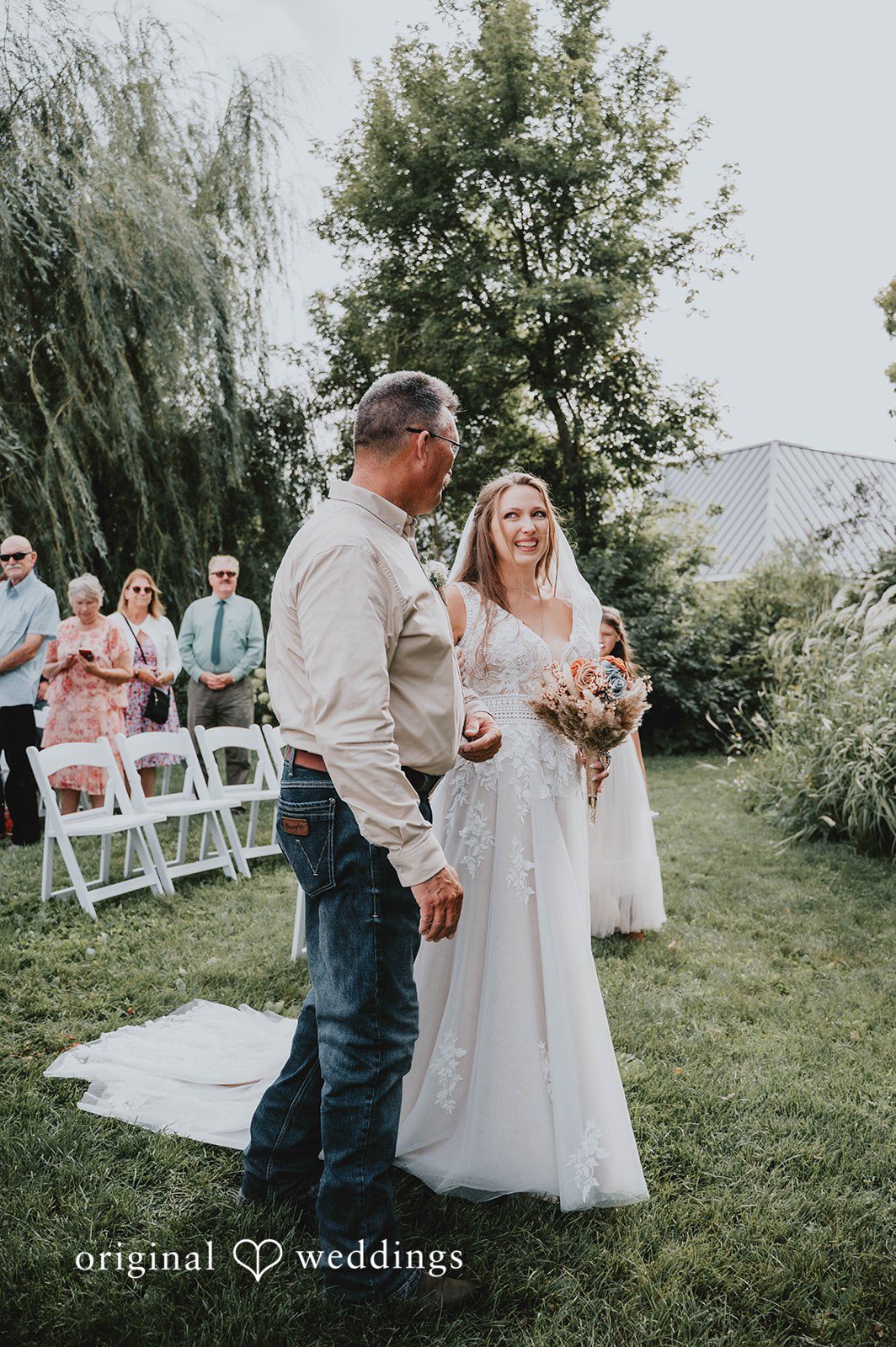 Couple walking past the guests