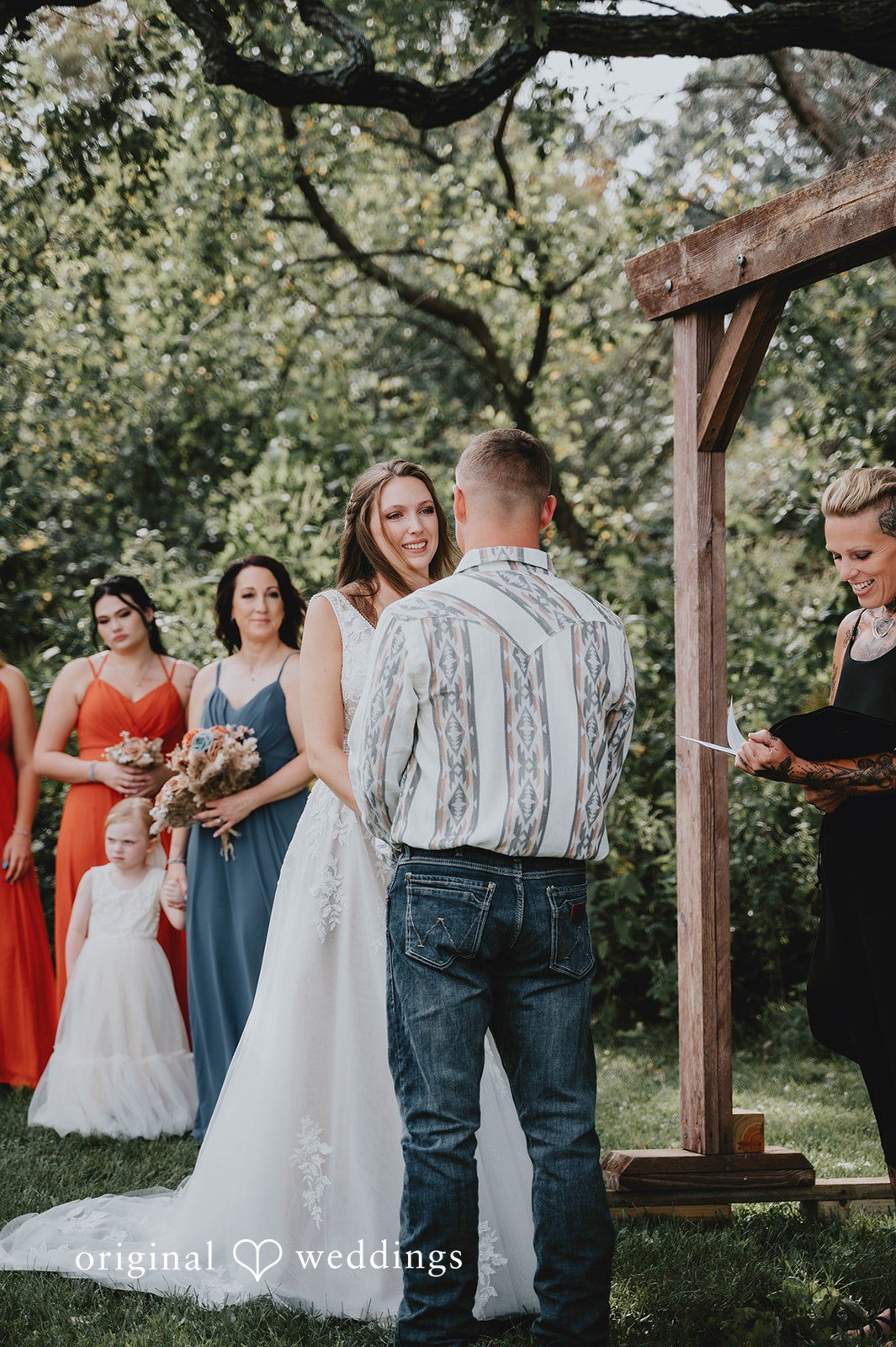 Couple at the altar at The Barn at Ballard Creek