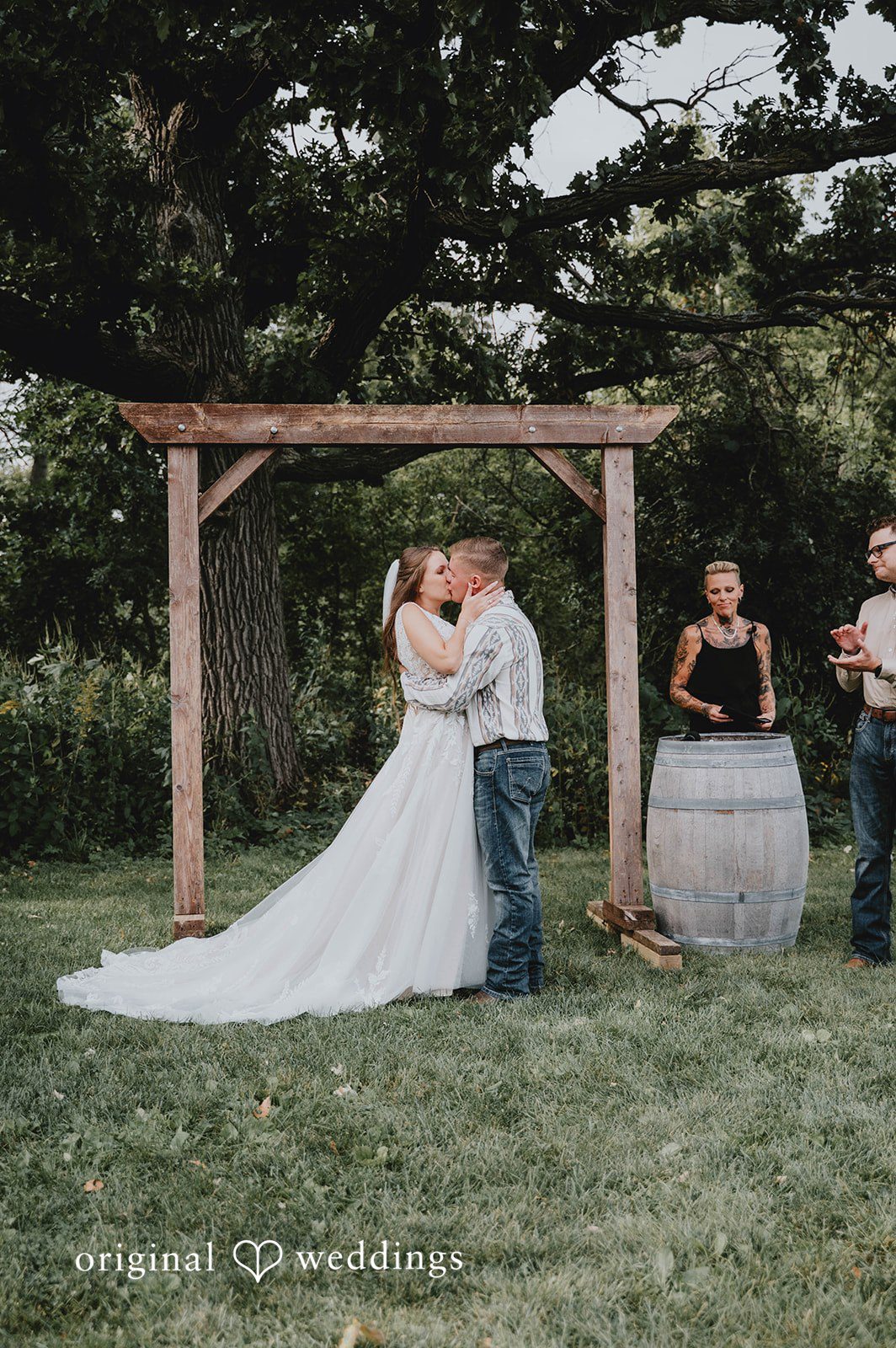 Couple at the wooden arch