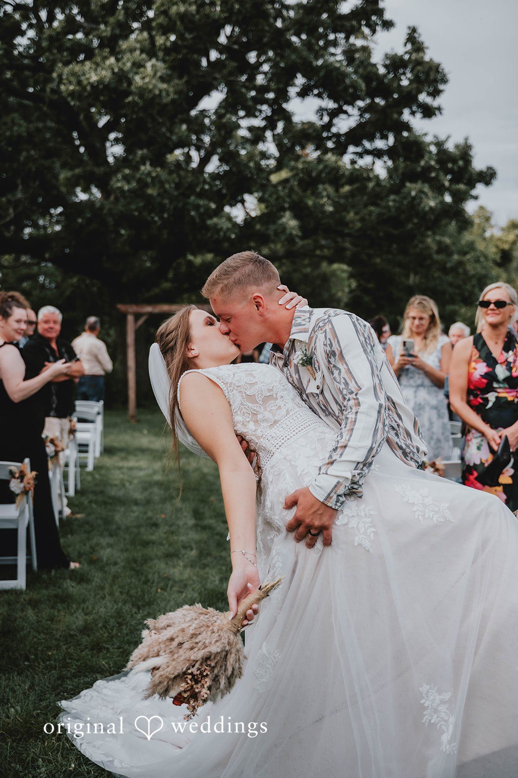 Couple kissing after the ceremony
