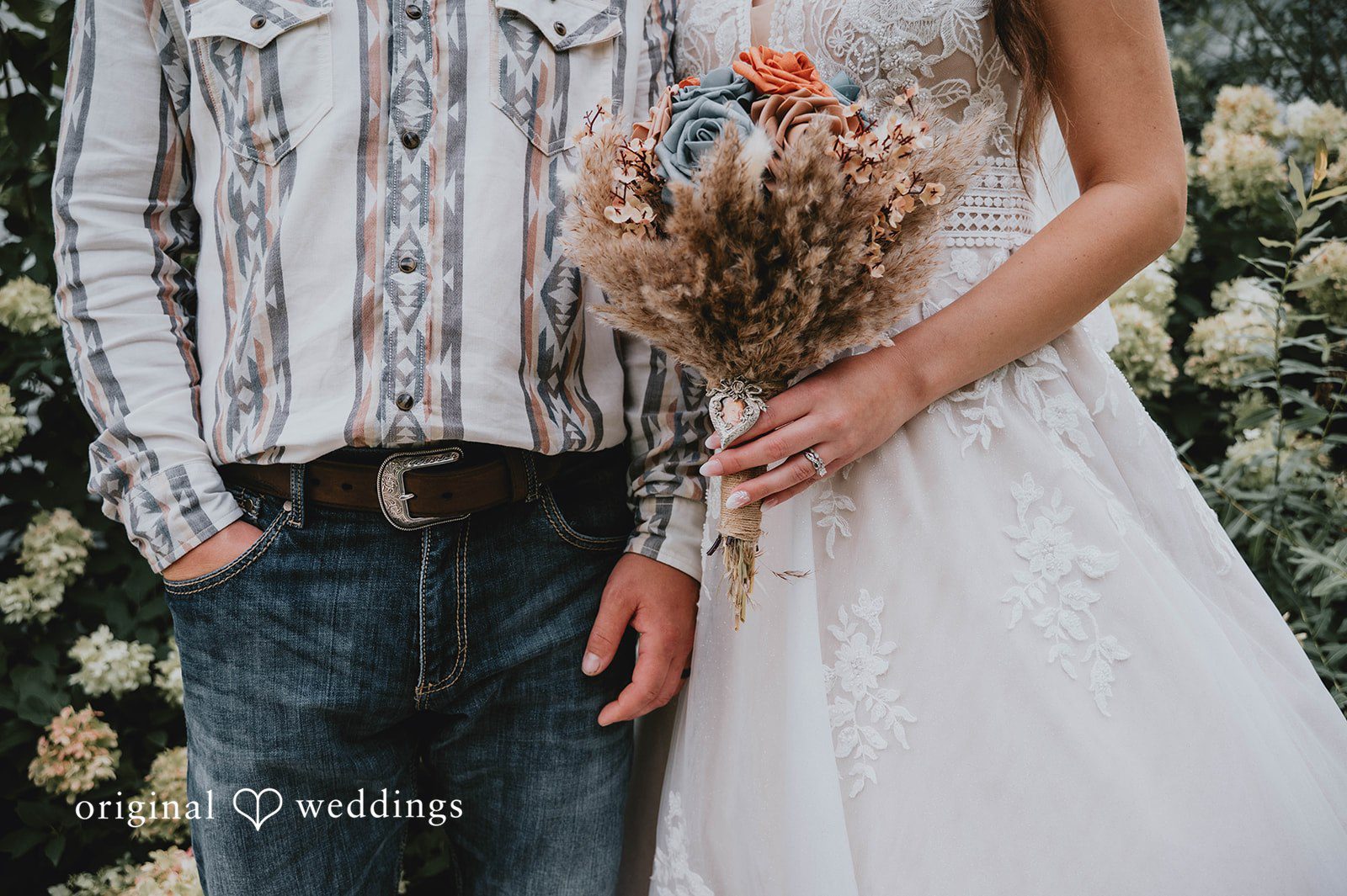 Couple holding the bouquet