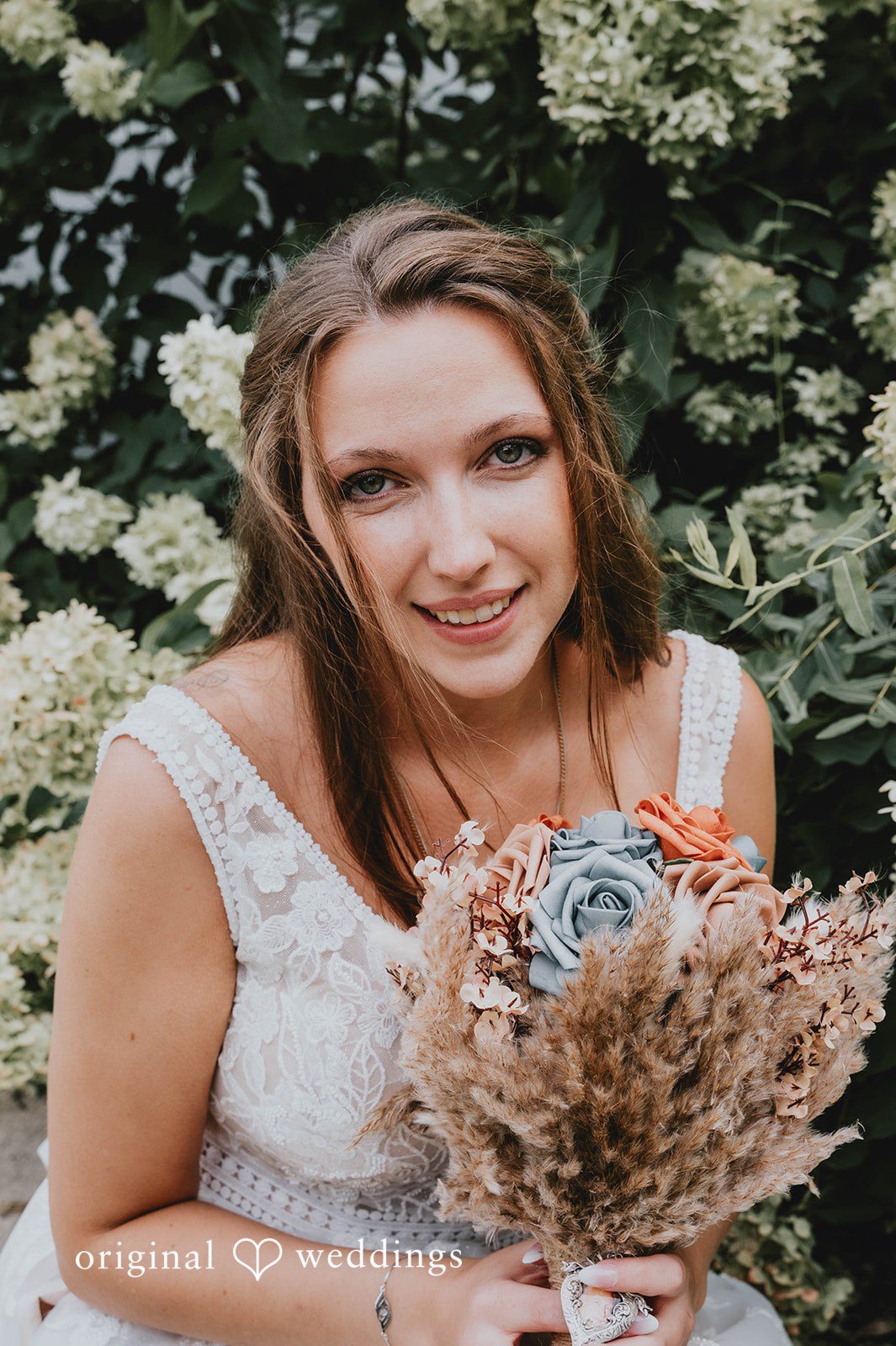 Bride holding her dried bouquet