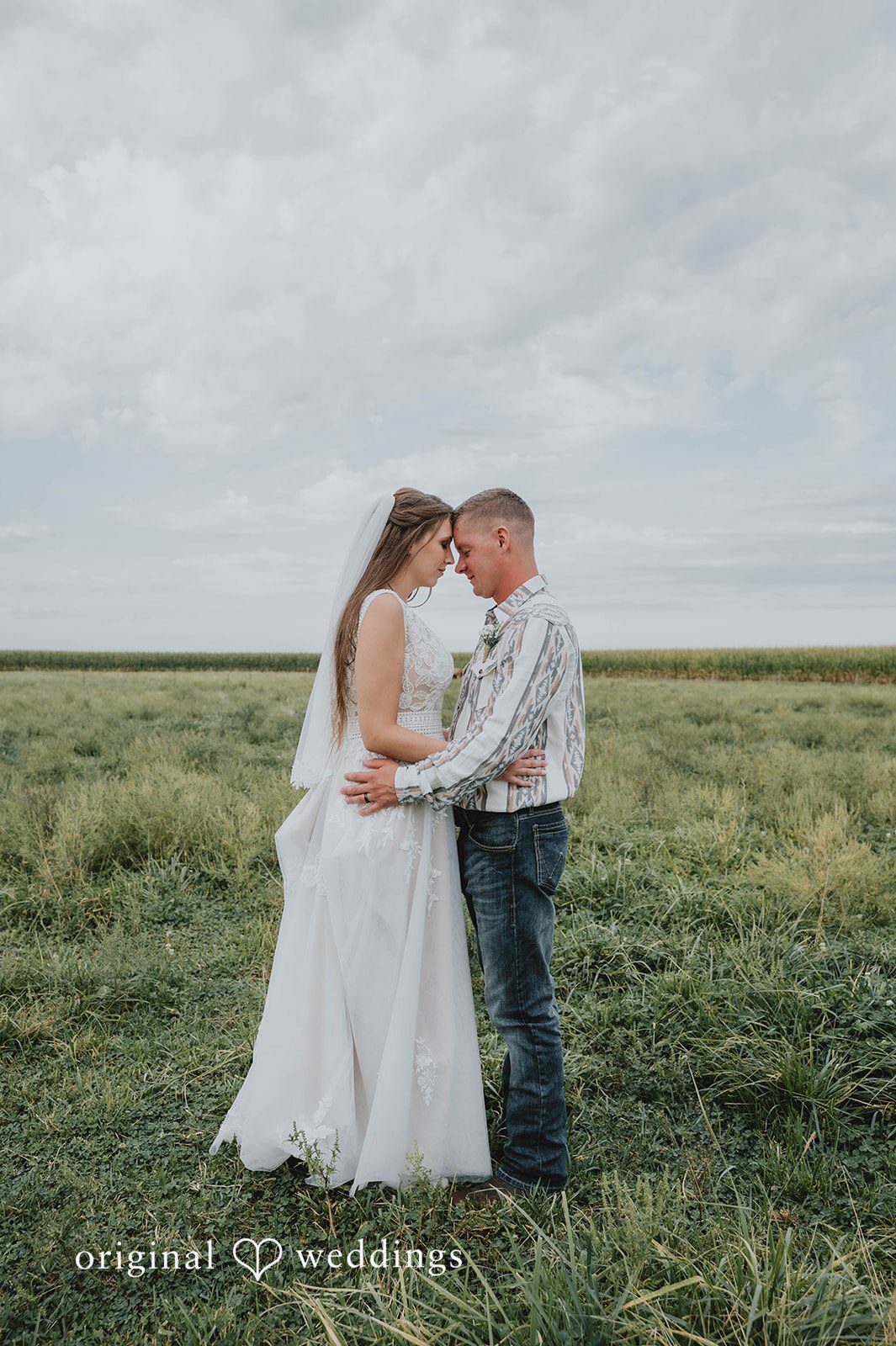 Couple standing in the meadow