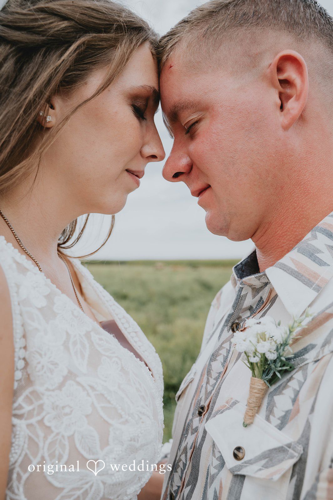 Couple touching foreheads up close