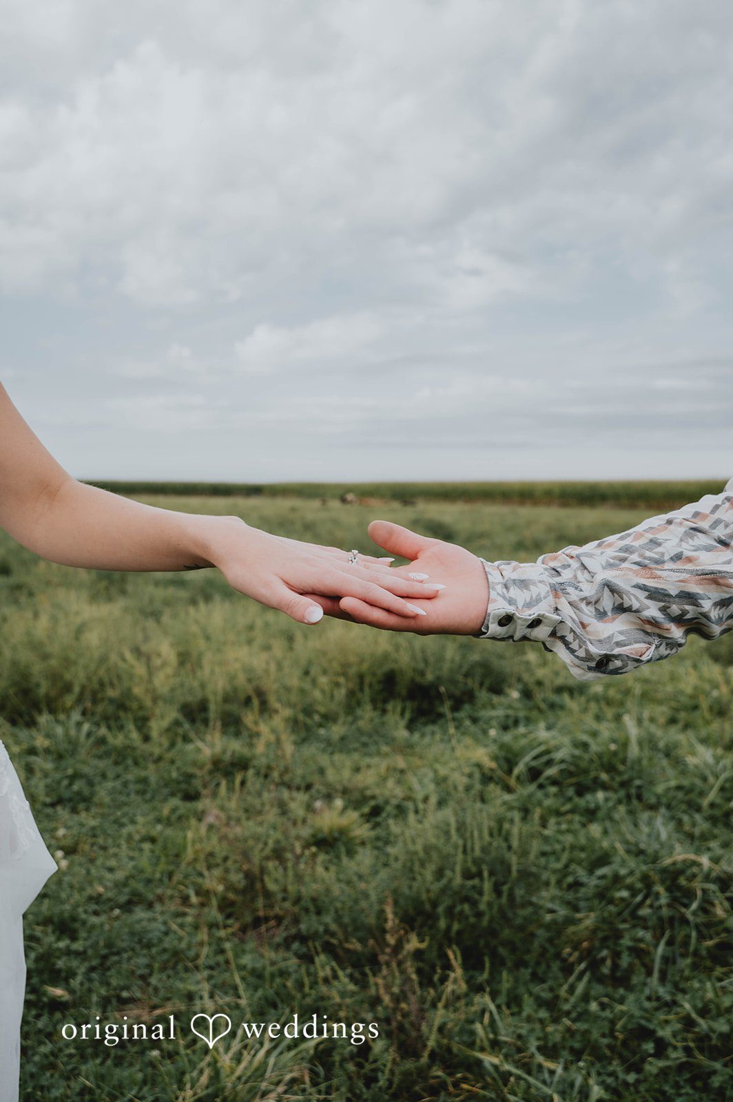 Couple's hands touching