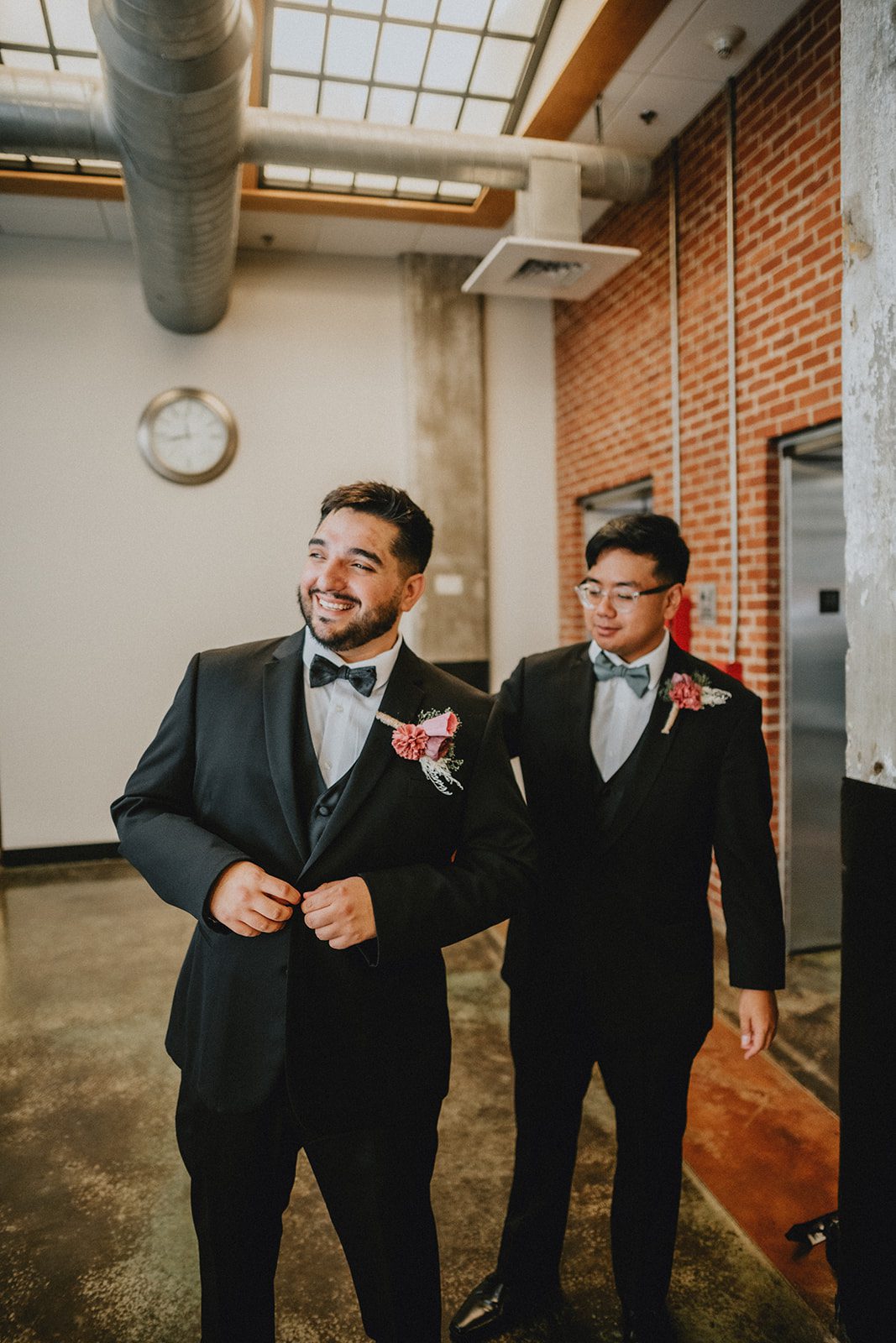 Groom getting ready with his groomsman Groom getting ready with his groomsman