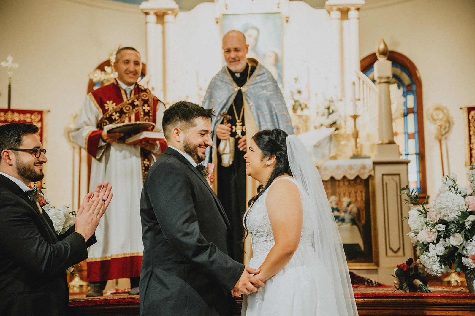 Couple sharing a moment at the altar Couple sharing a moment at the altar