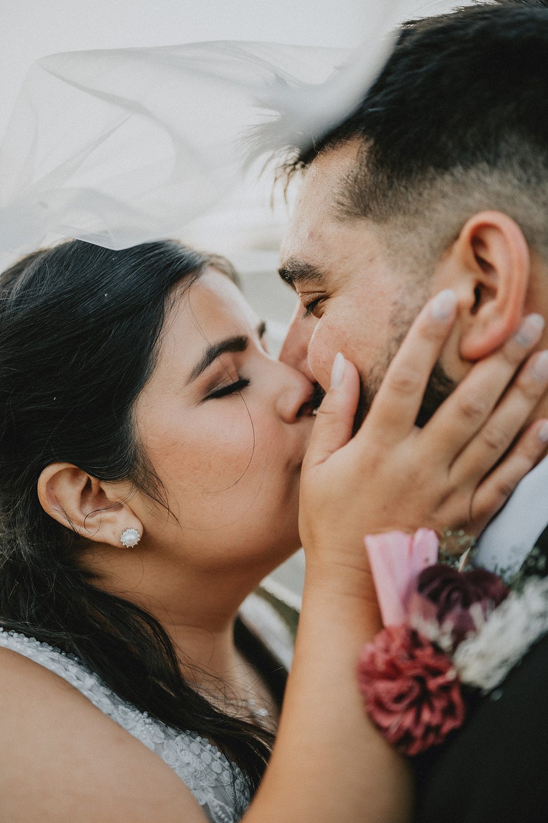 Couple sharing a sweet kiss Couple sharing a sweet kiss