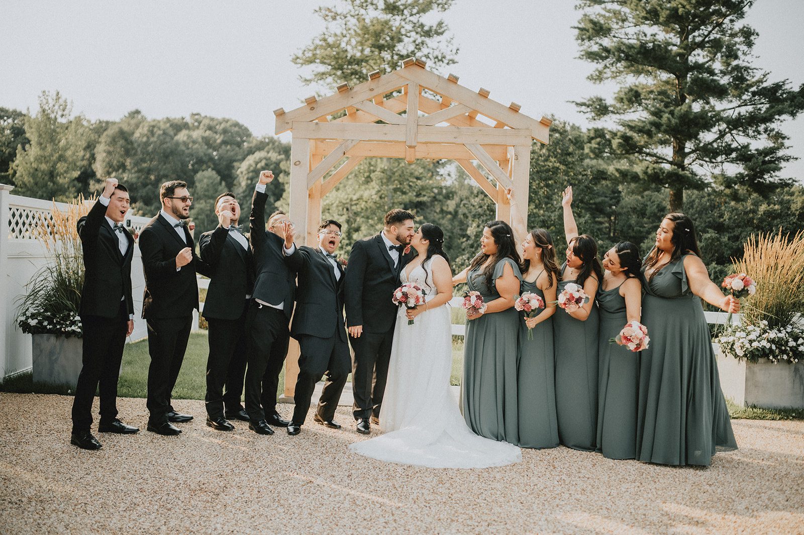 Wedding party under the arbor Wedding party under the arbor