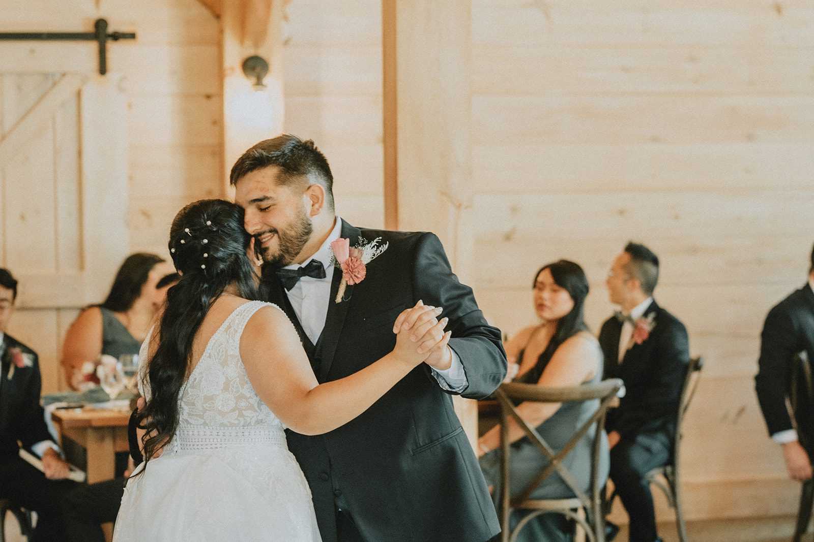 First dance under the chandeliers, captured by Providence wedding photographers First dance under the chandeliers, captured by Providence wedding photographers
