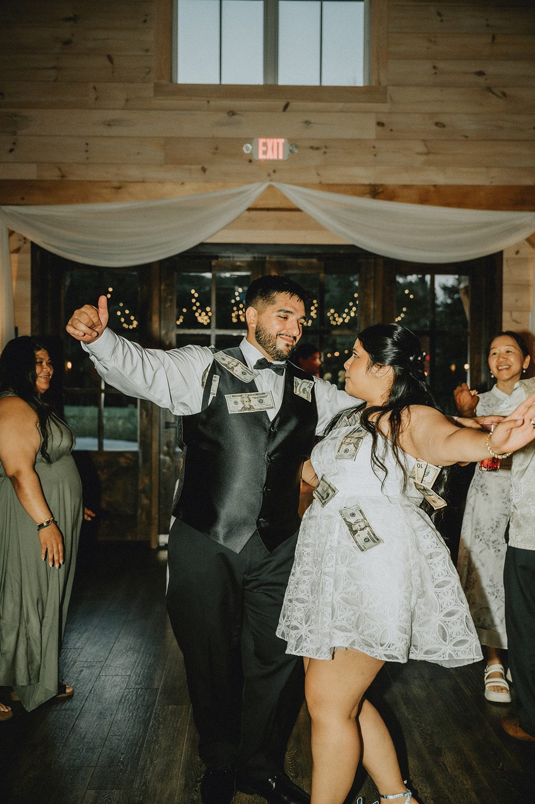 Bride celebrating on the dance floor Bride celebrating on the dance floor
